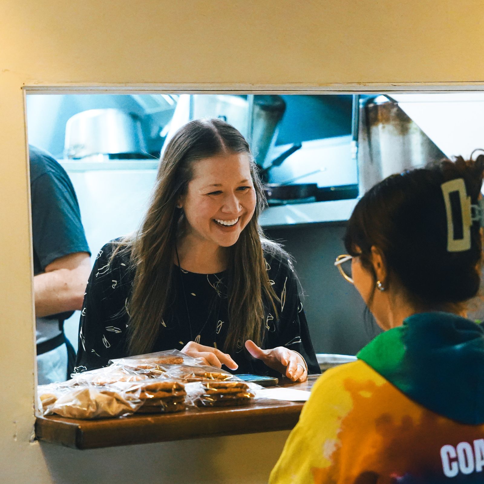 Smiling service at the pop-up window
